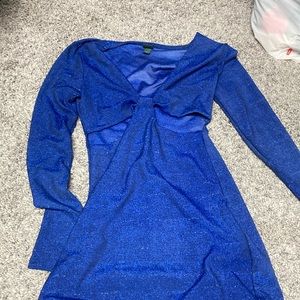 Sparkling royal blue long sleeved dress with slits under the chest